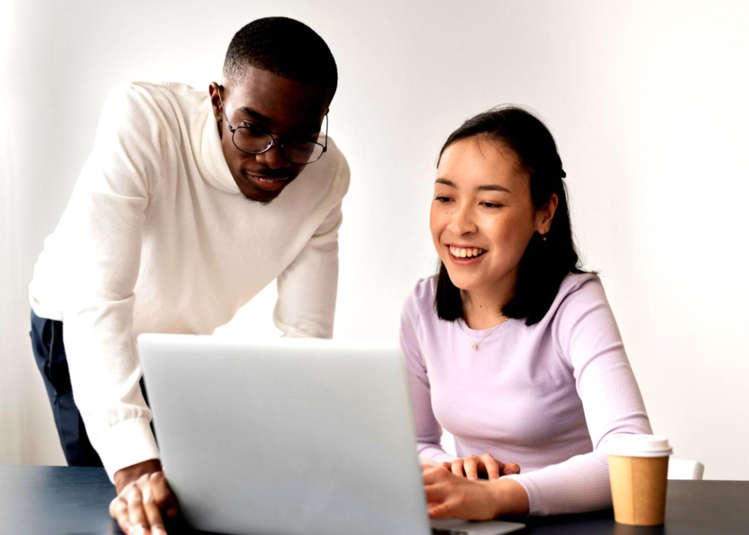 Finance professionals working on real business cases in modern learning environment